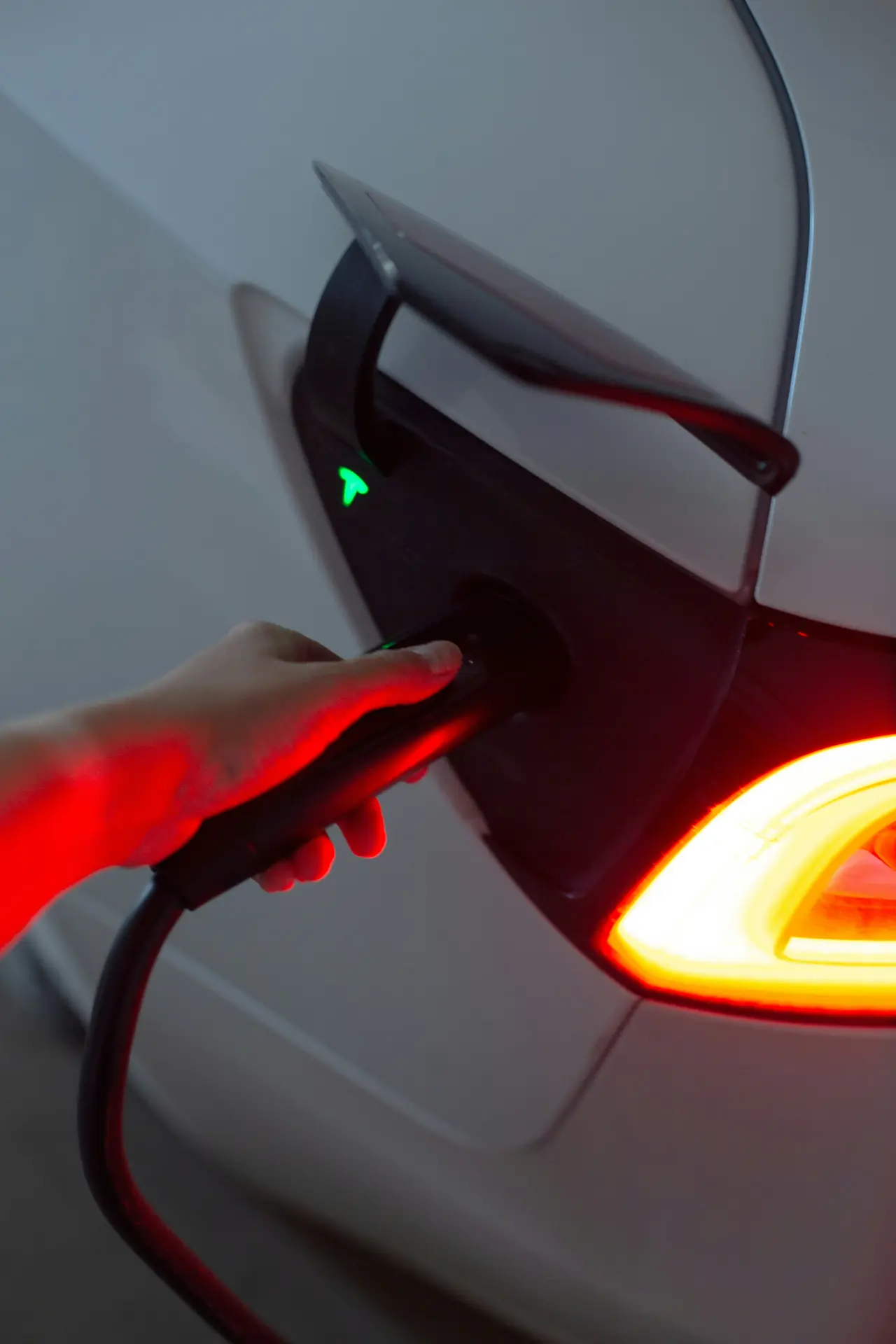 A charging plug connected to an electric car