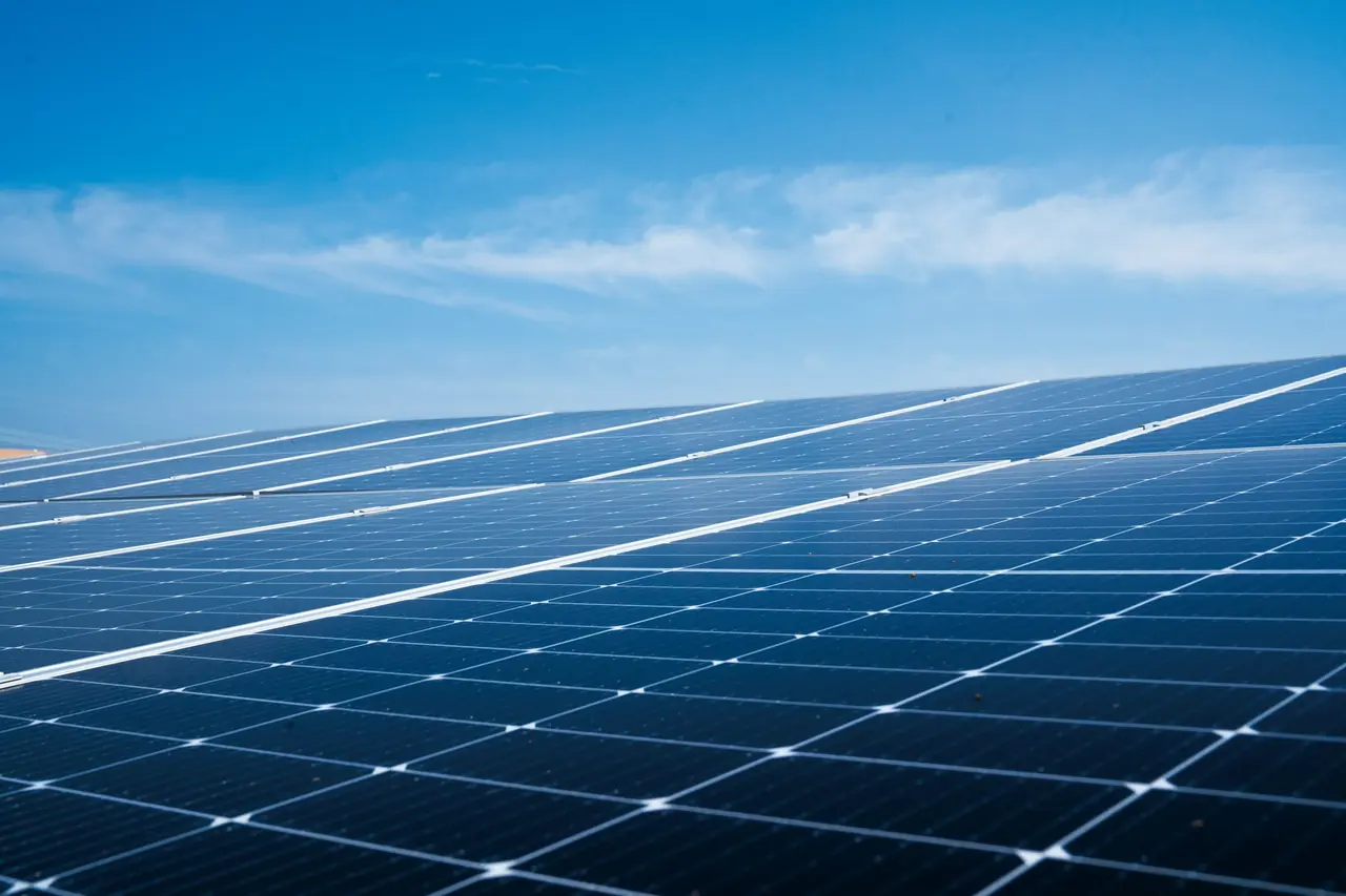 Solar panels under a blue sky